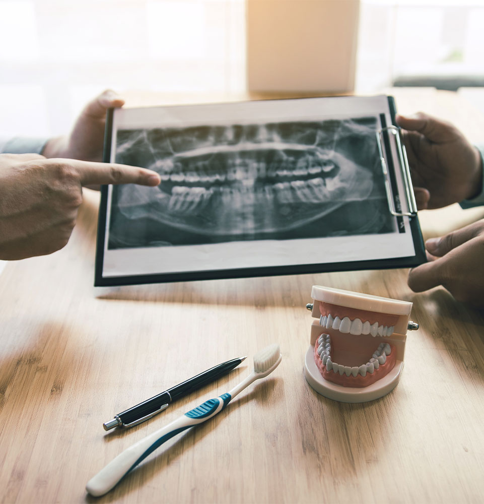 doctor and patient going over dental consultation