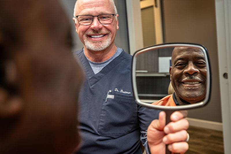 patient smiling brightly after their dental procedure